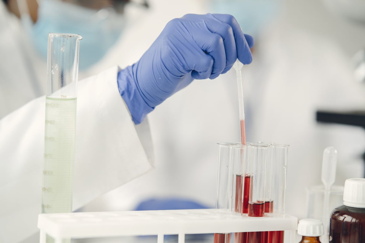 Laboratory Worker Studying Blood Samples 